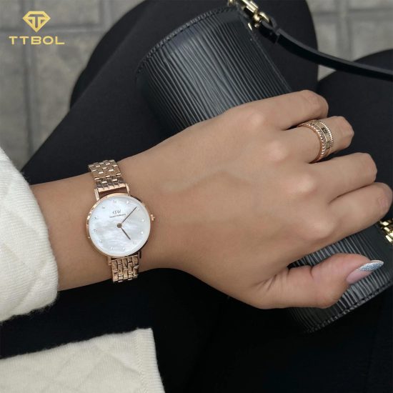 ساعت مچی زنانه دنیل ولینگتون رزگلد صفحه صدف DANIEL WELLINGTON DW00100613